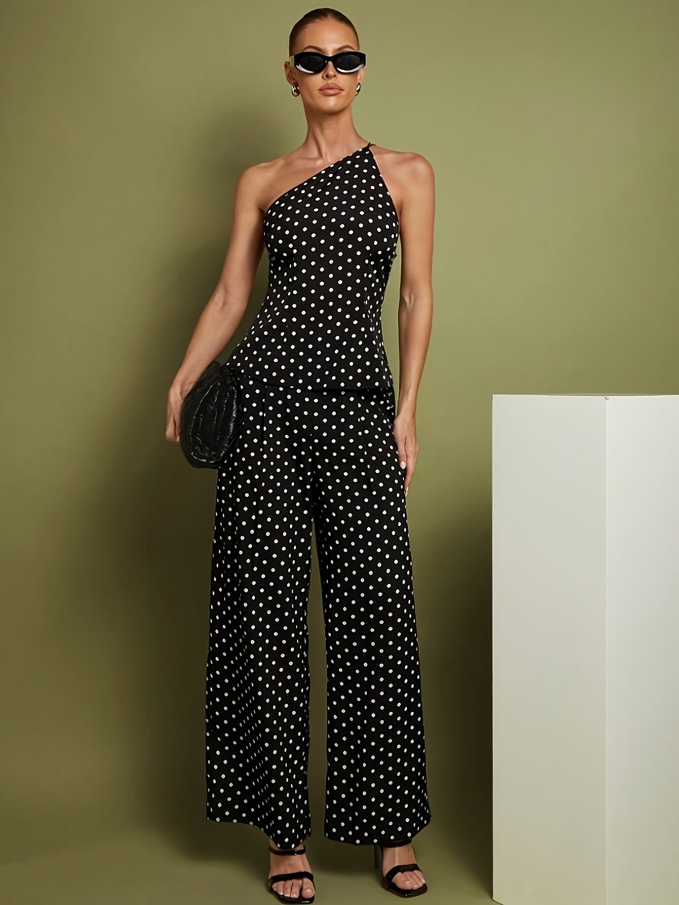 Jaida | One-shoulder jumpsuit met stippenprint