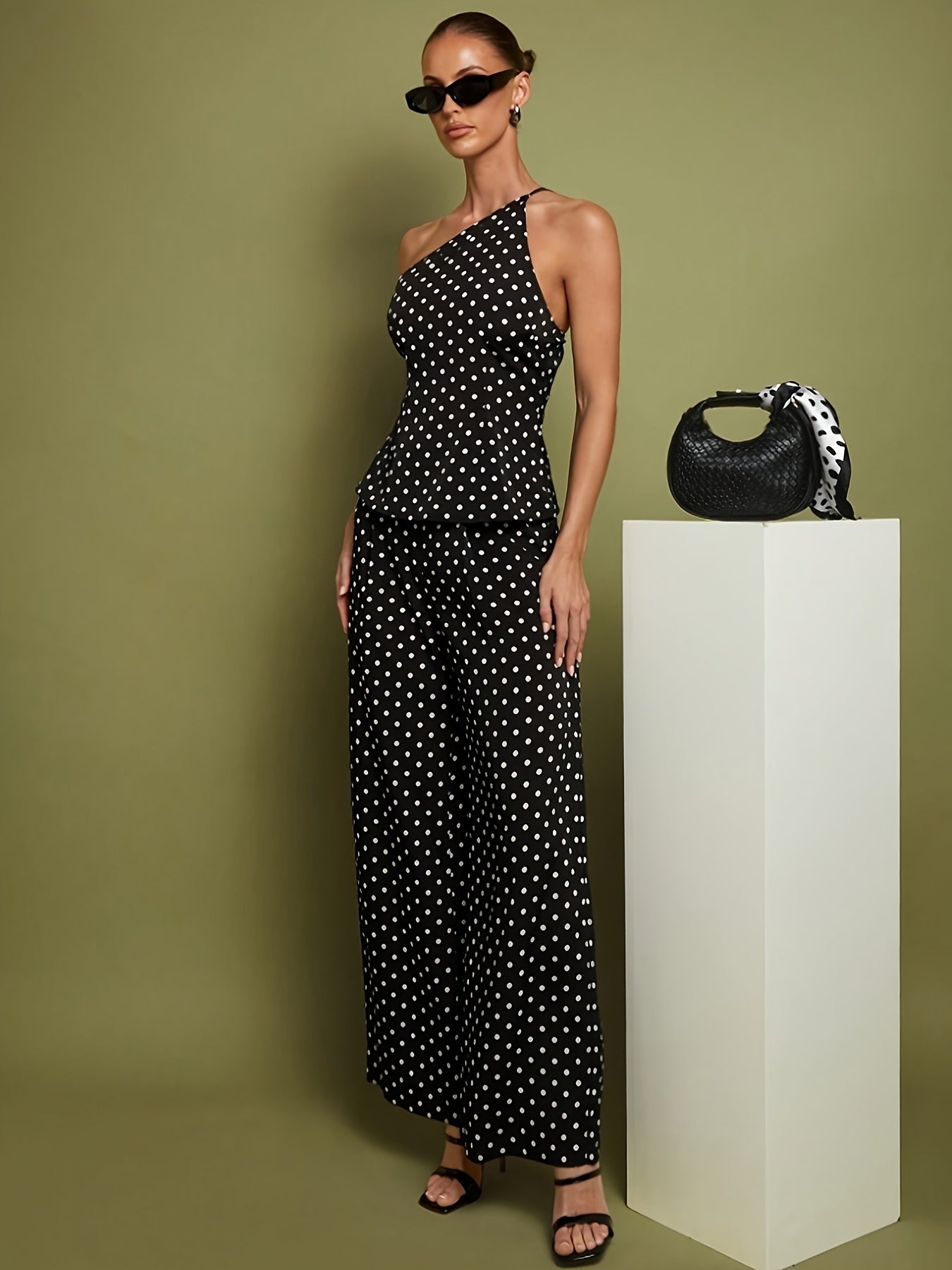 Jaida | One-shoulder jumpsuit met stippenprint