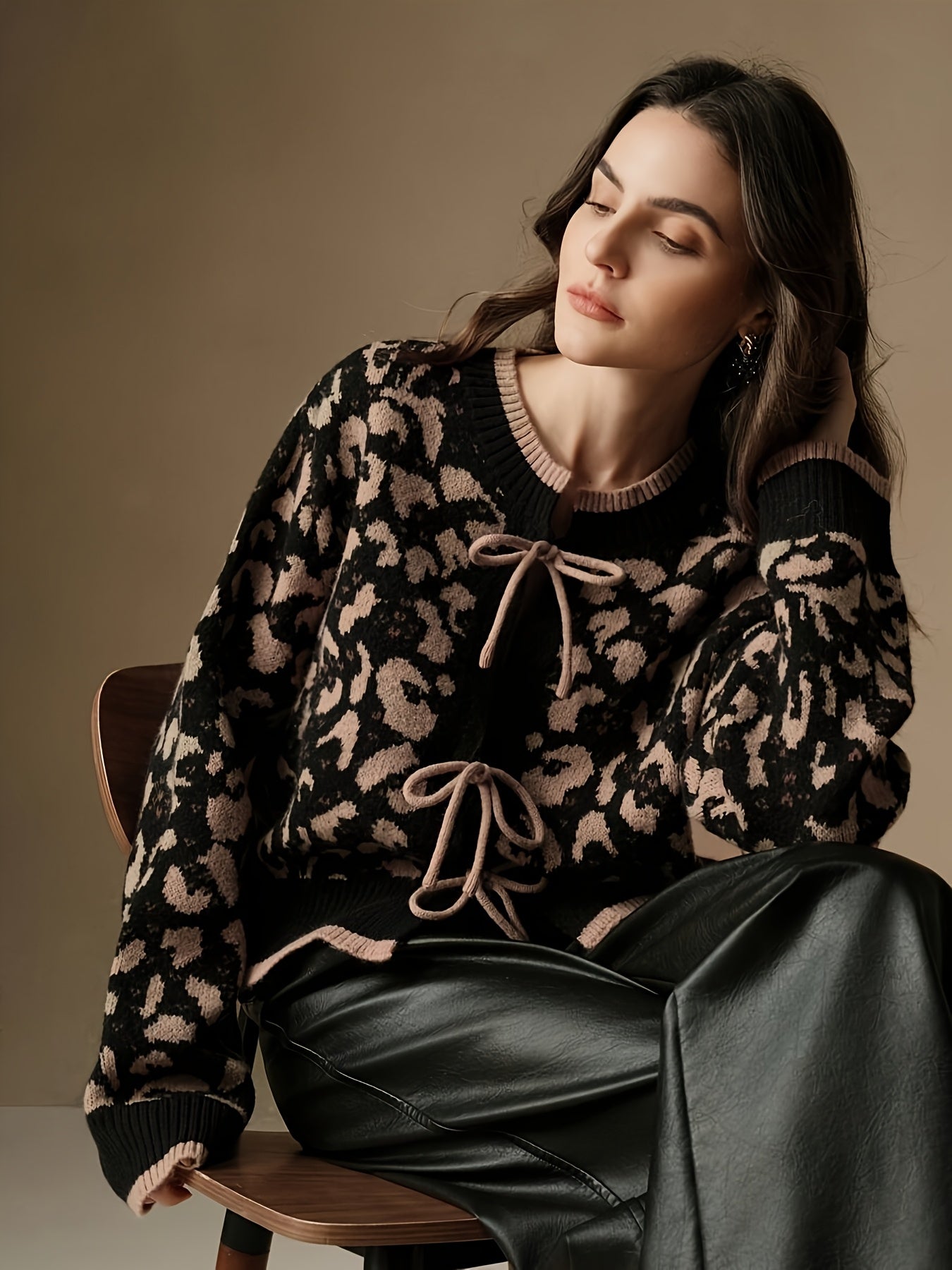 Cardigan with tie closure and jacquard pattern