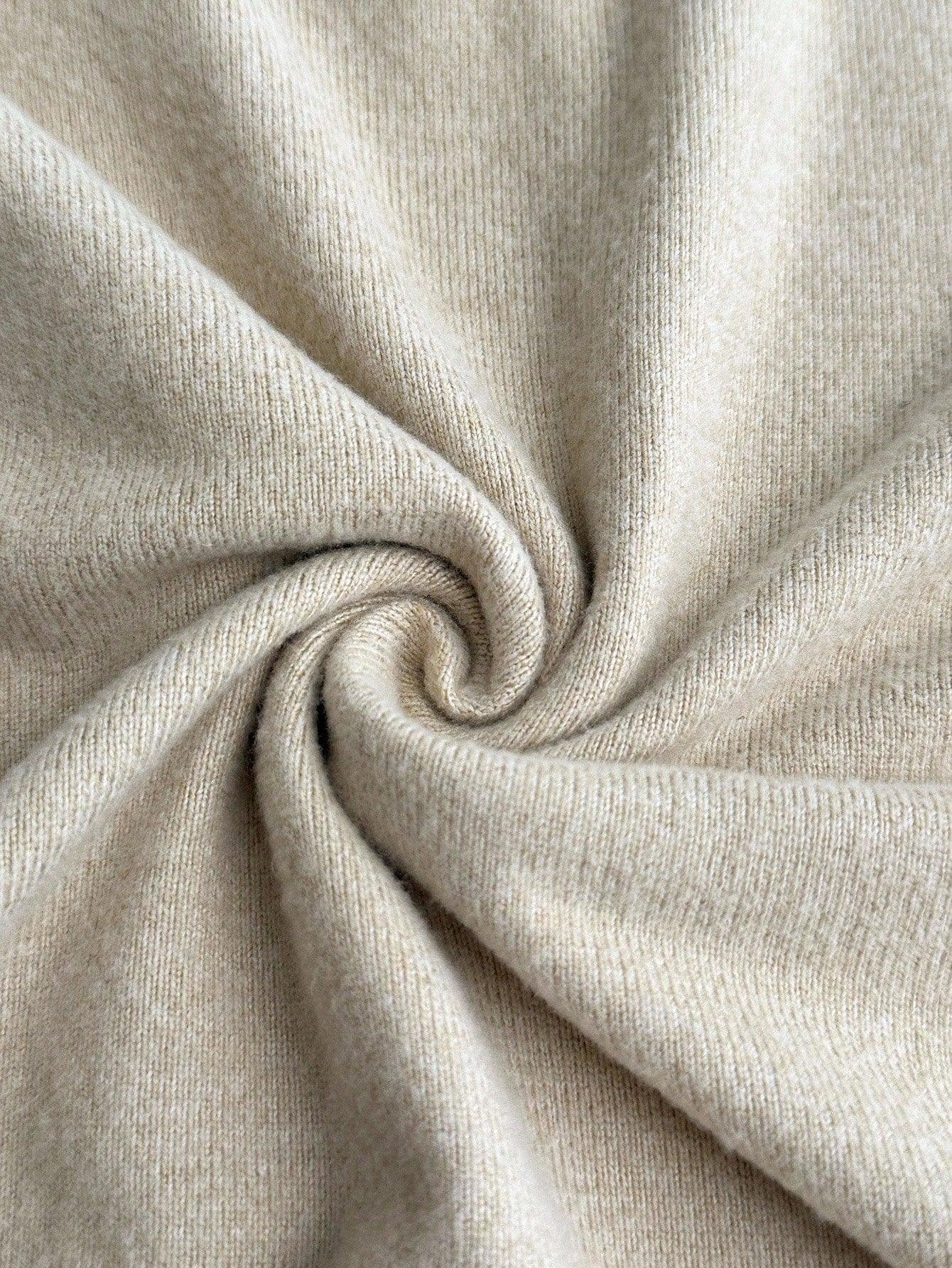 Padded hoodie and grey trousers