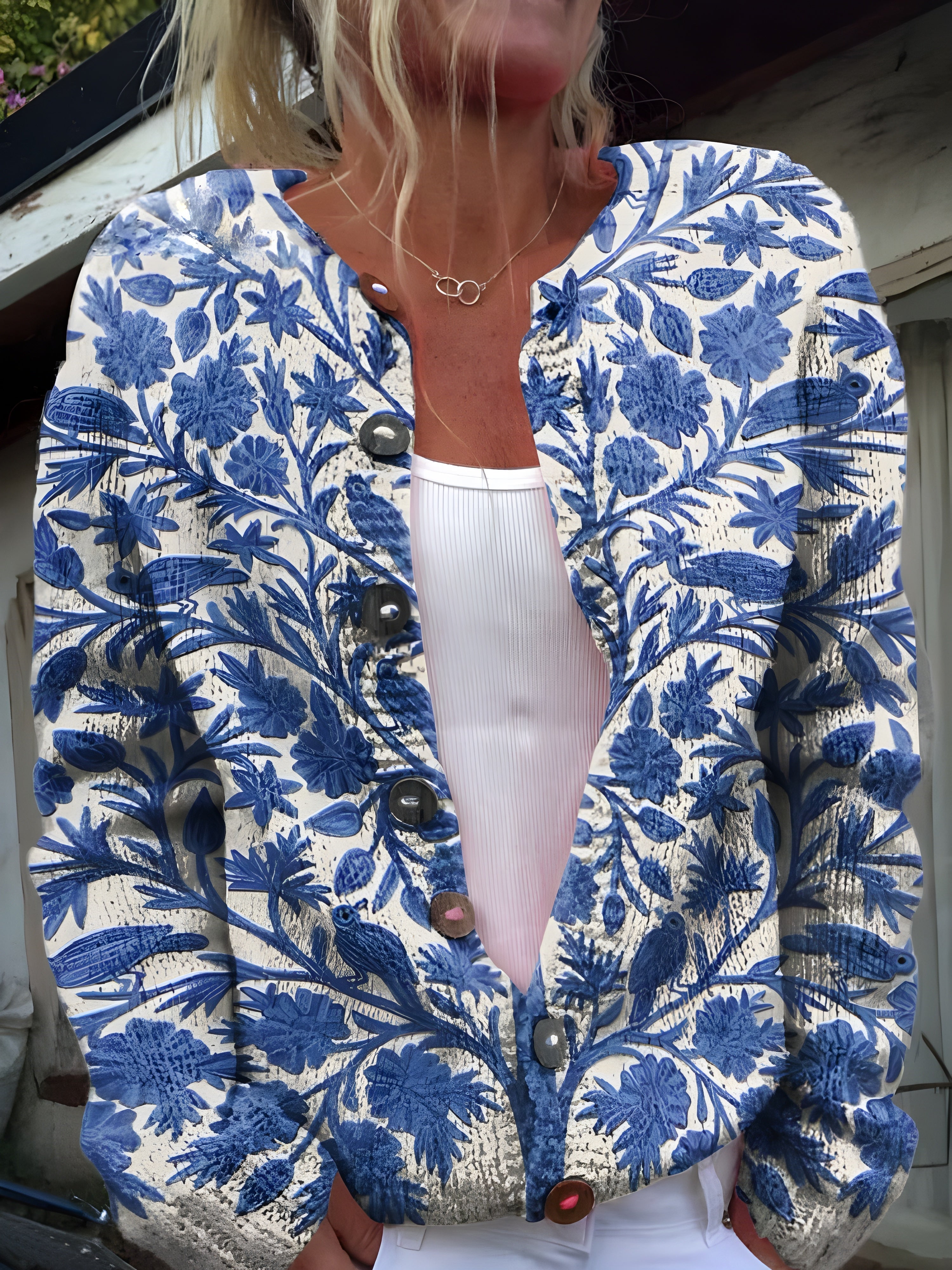 Maris | blauw vest met bloemenprint