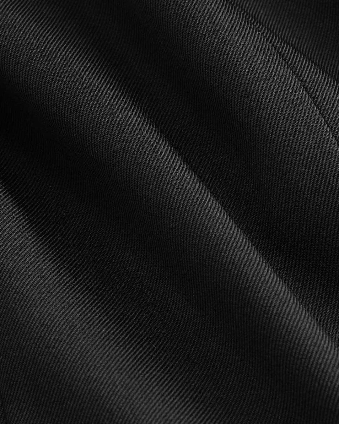 Connie | Black high-waist pleated trousers