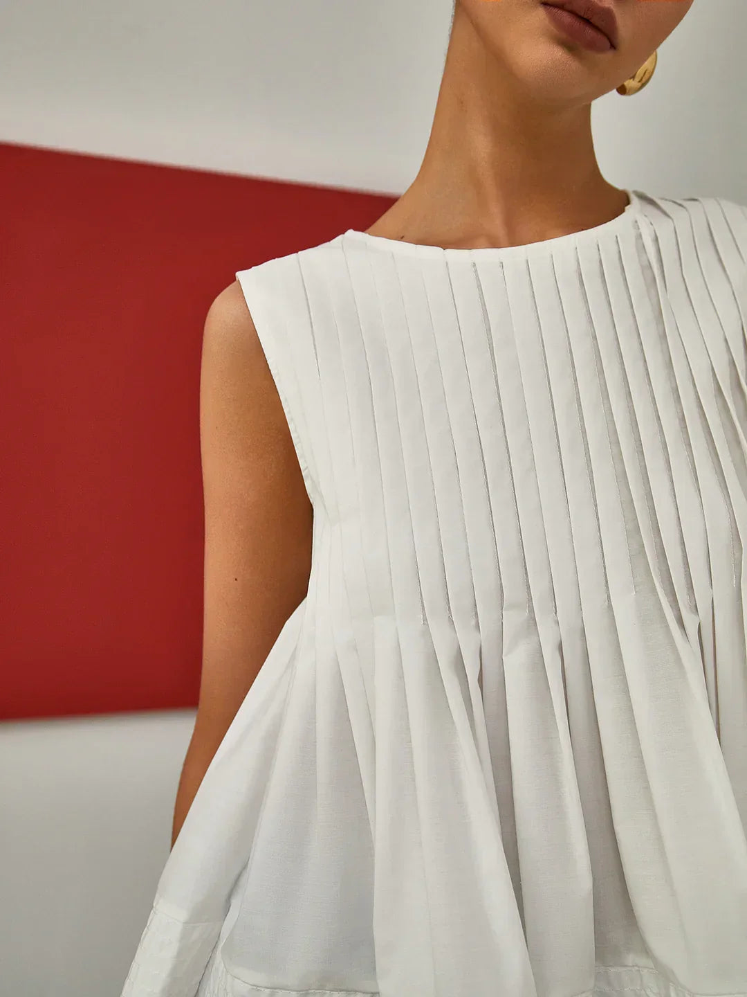 Tala | Pleated sleeveless blouse