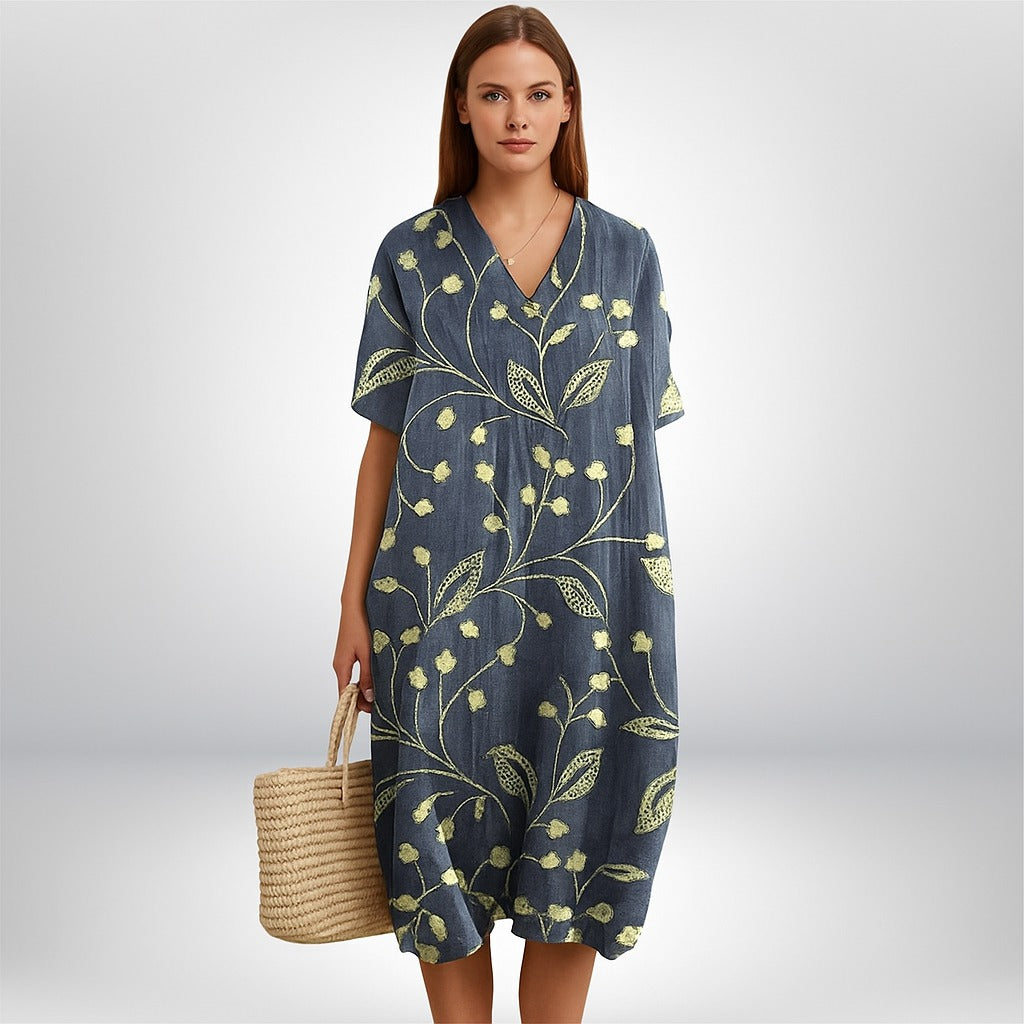 Jente | Midi‑jurk met botanische print