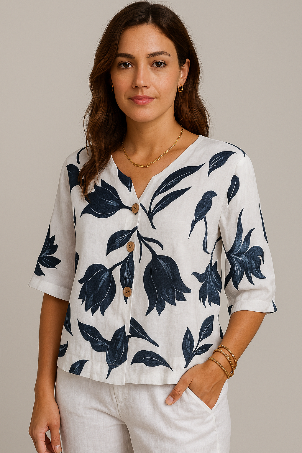 White short-sleeve blouse with navy floral print