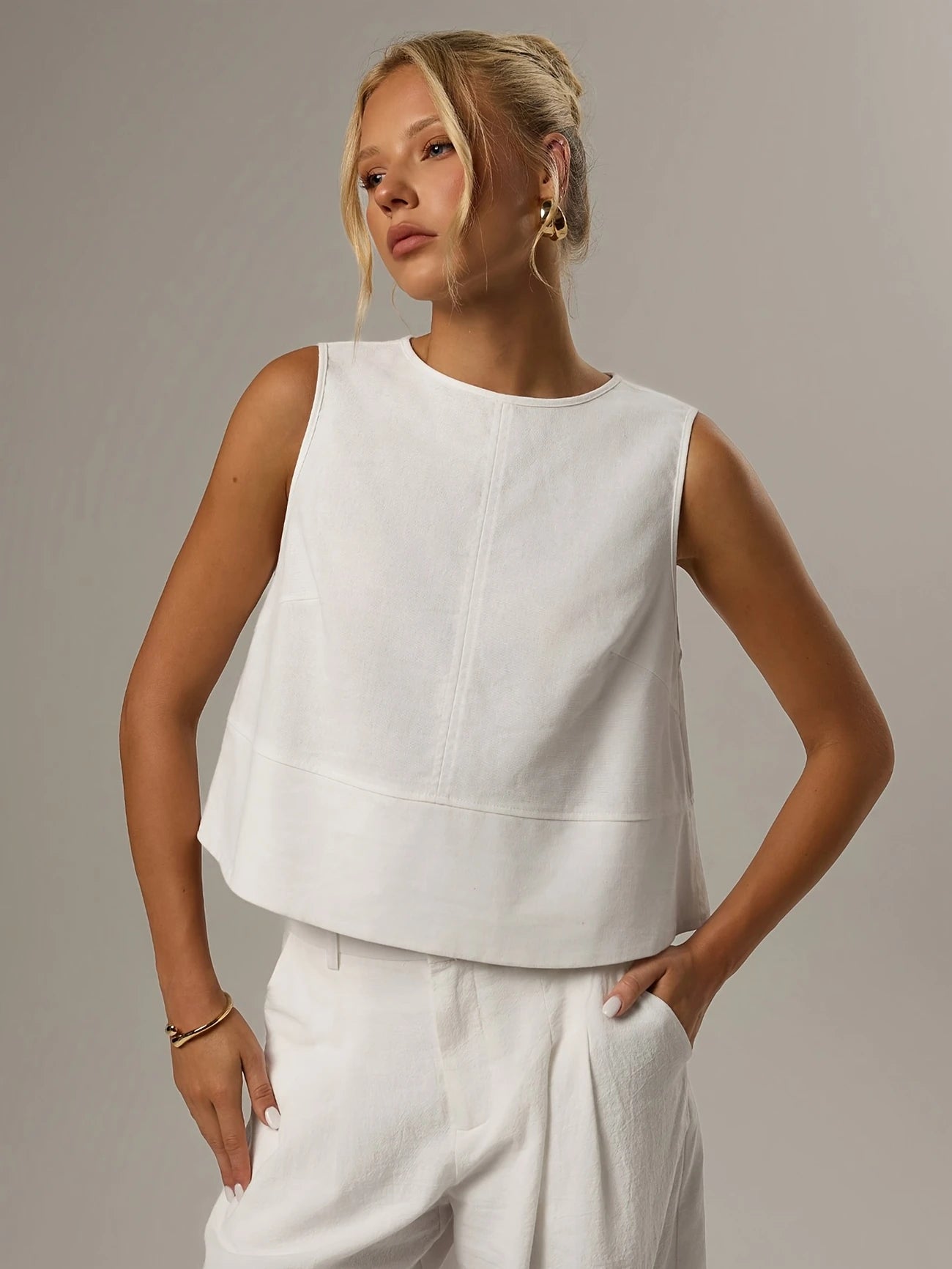 White sleeveless top