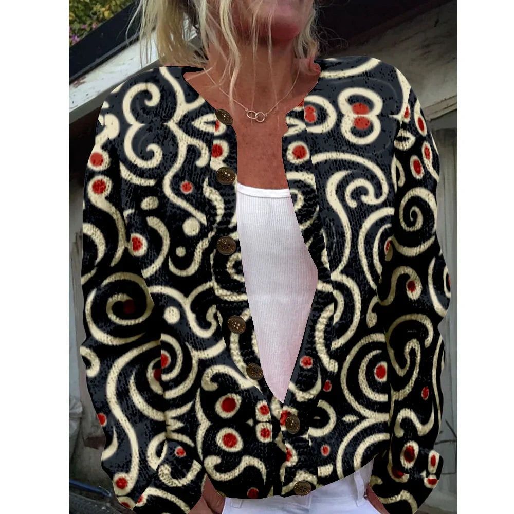 Abbie | Gebreid vest met grafische swirlprint