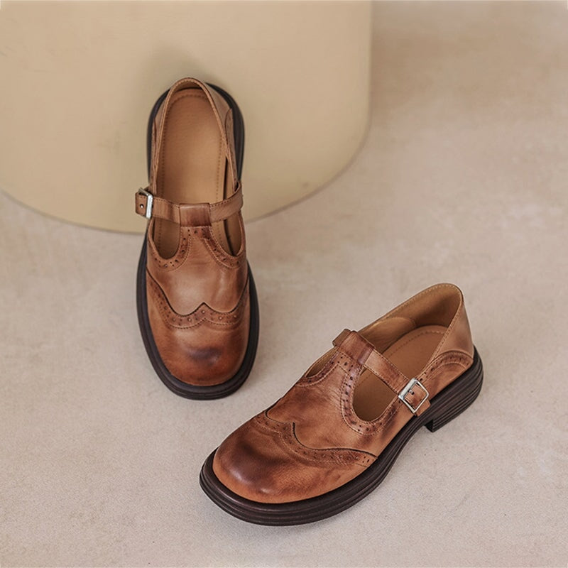 Brown T‑strap mules