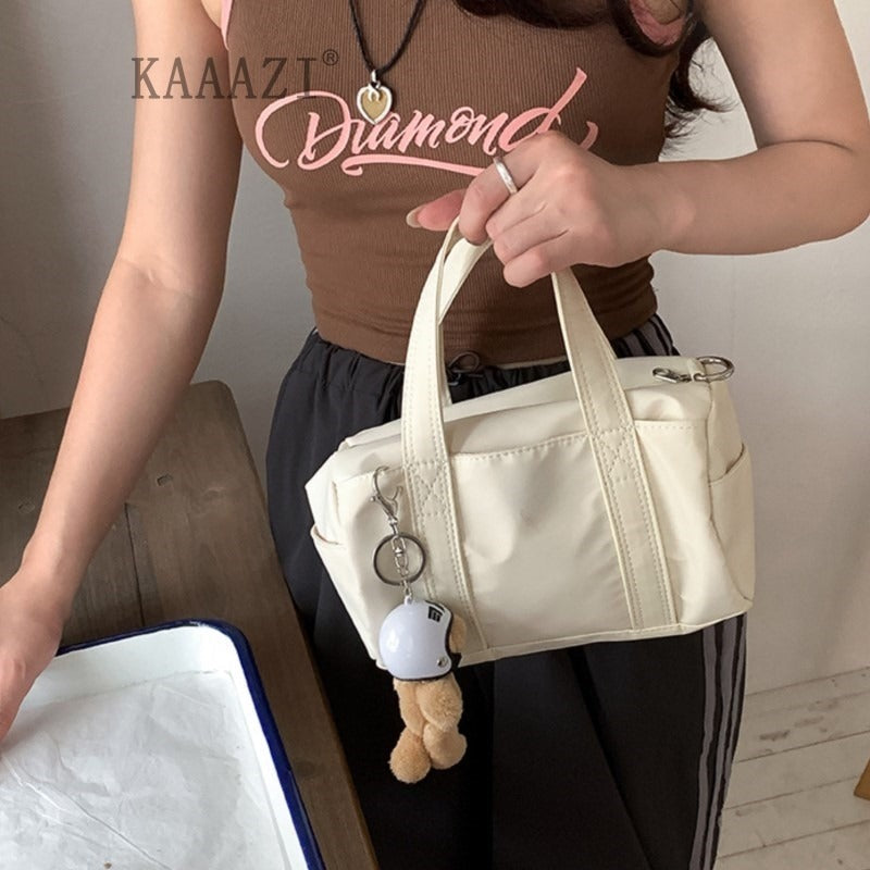 Mini Duffle Crossbody