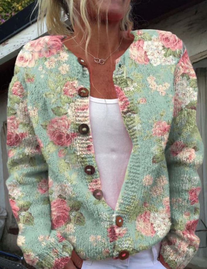 Licia | Mintgroen vest met bloemenprint