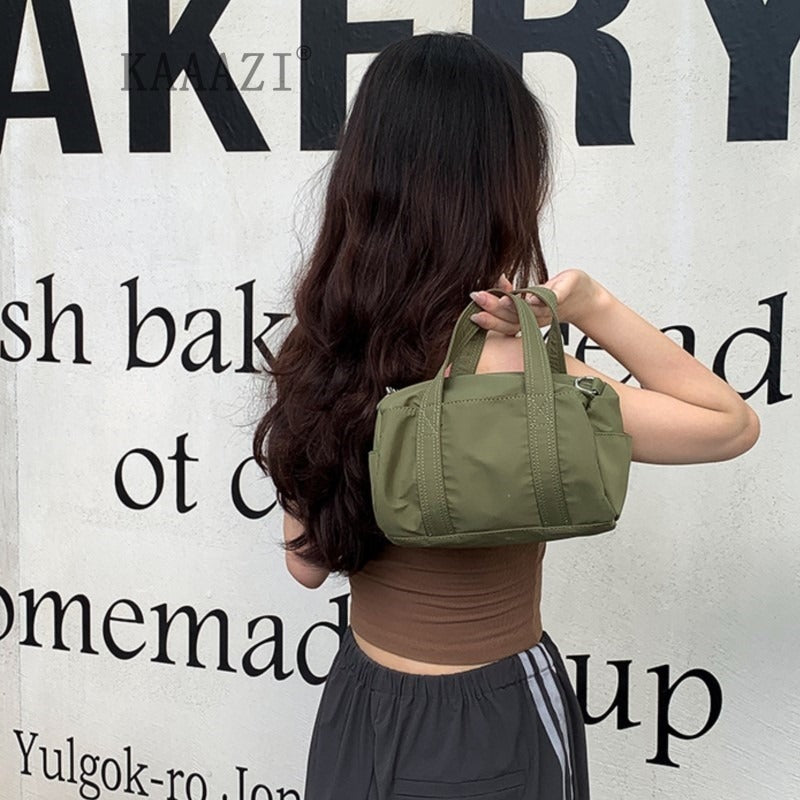 Mini Duffle Crossbody